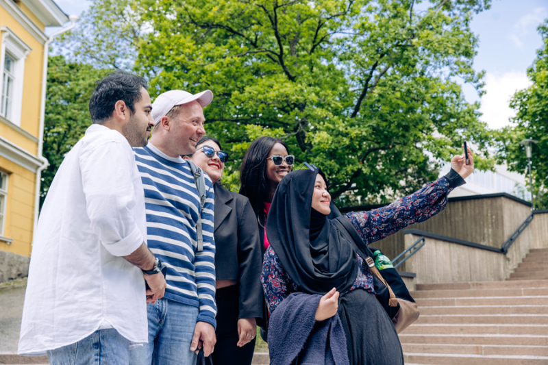 Students taking a group selfie